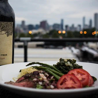 Garlic Marinated Flank Steak with Fresh Herb & Olive Tapenade